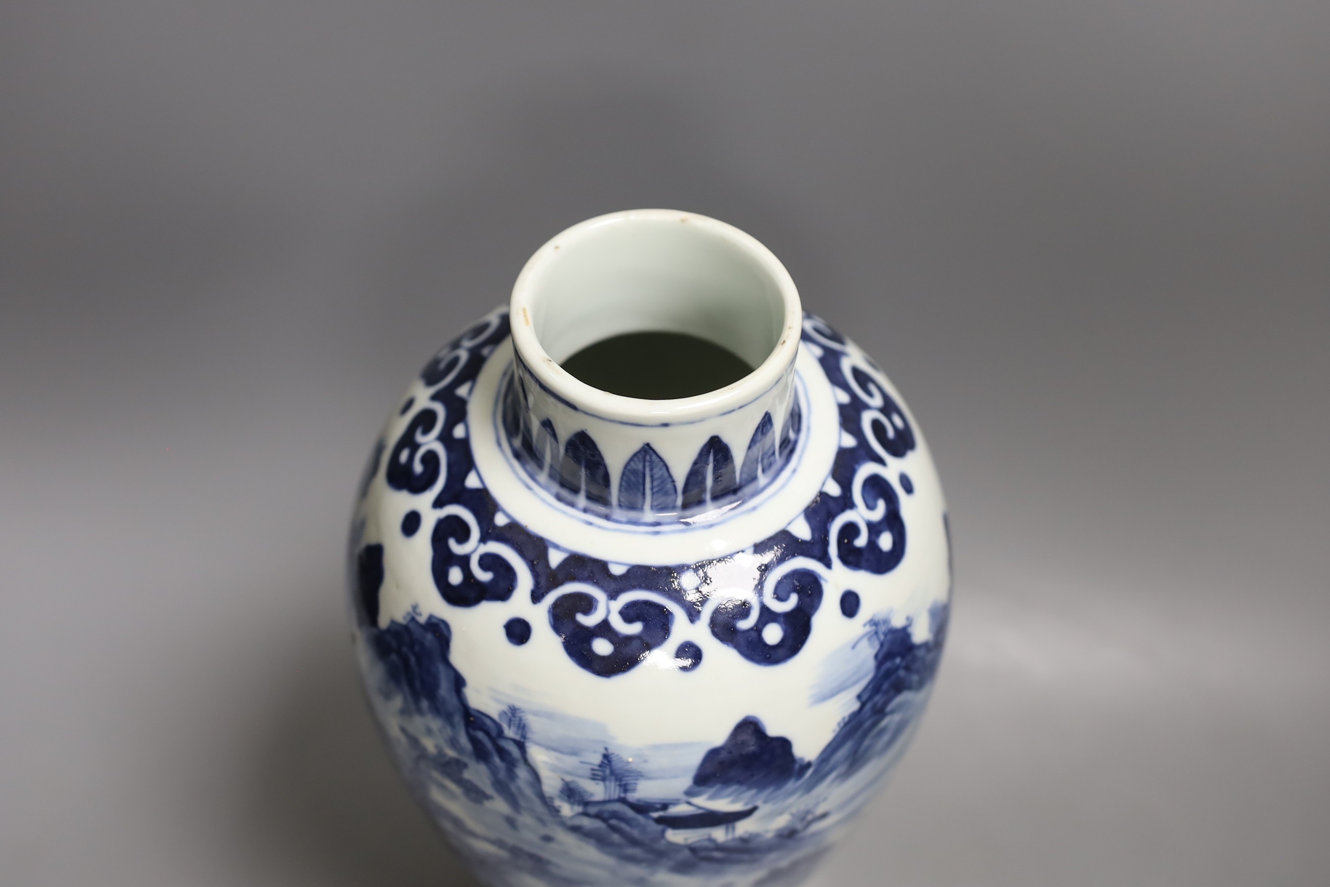 A 19th century Chinese blue and white landscape vase 29cm